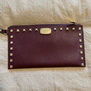 Gold studded wristlet